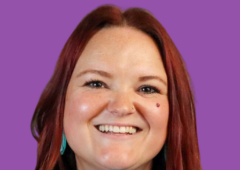 Headshot of Meghan Hyatt with a purple background.