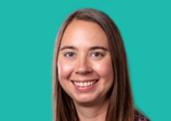 Headshot of Amanda Cash with a teal background