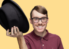 Headshot of youth leader, Nick, tipping a hat.